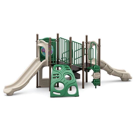 Boulder Dash Natural toddler playground structure with two tan slides, green crawl tunnel, low climber, and activity panels for ages 2 to 5